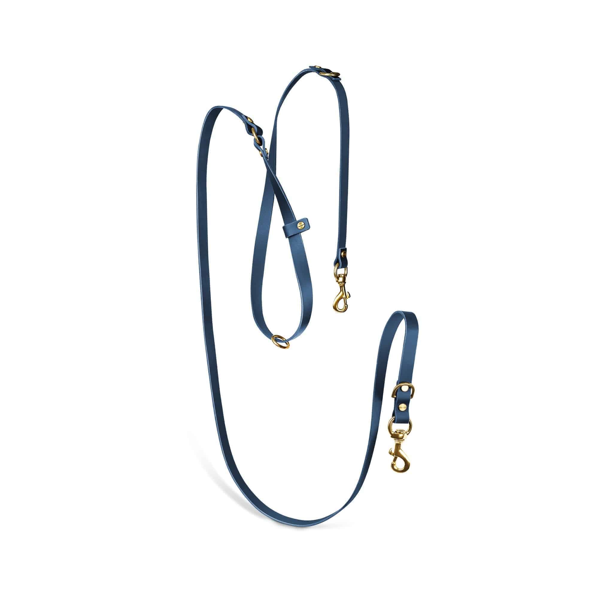 Atlas leather collar and Aura hands-free leash bundle from The Dogs Company, featuring midnight navy leather and a blue leash.