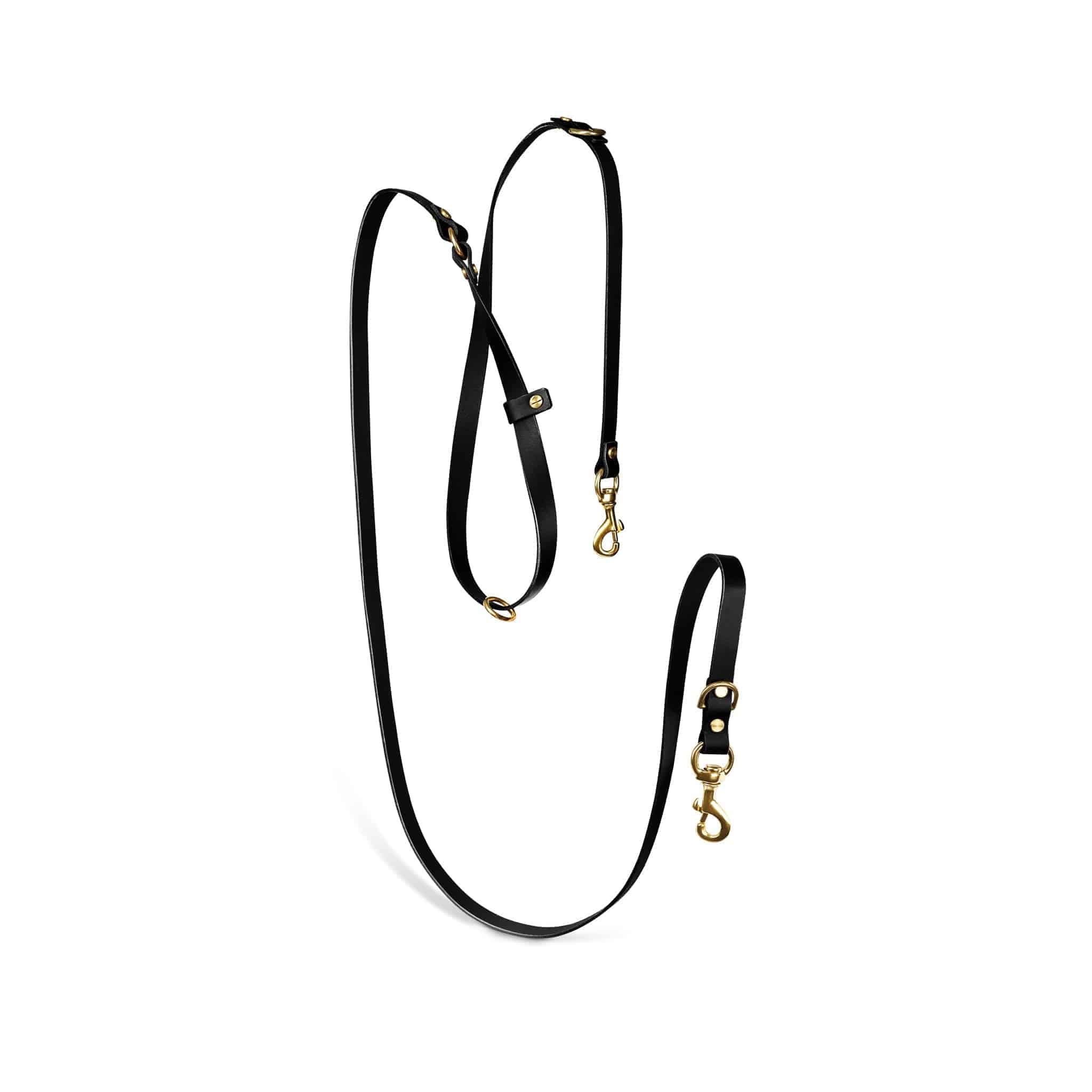 Atlas leather collar and Aura hands-free leash bundle from The Dogs Company, featuring black leather and durable design.