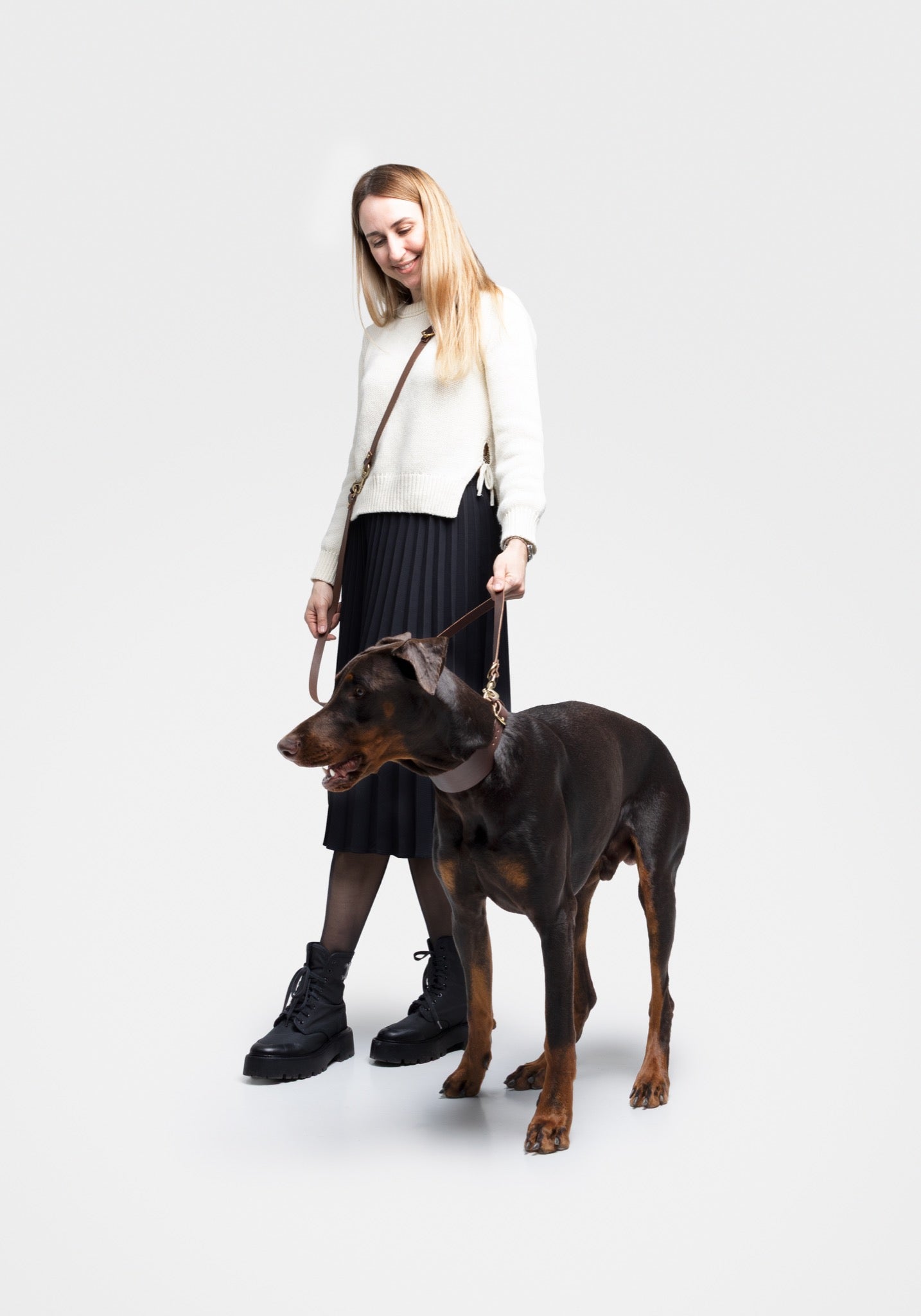 Atlas Leather Collar and Aura Handsfree Leash bundle for Doberman, featuring forest green leather collar and matching leash by The Dogs Company.