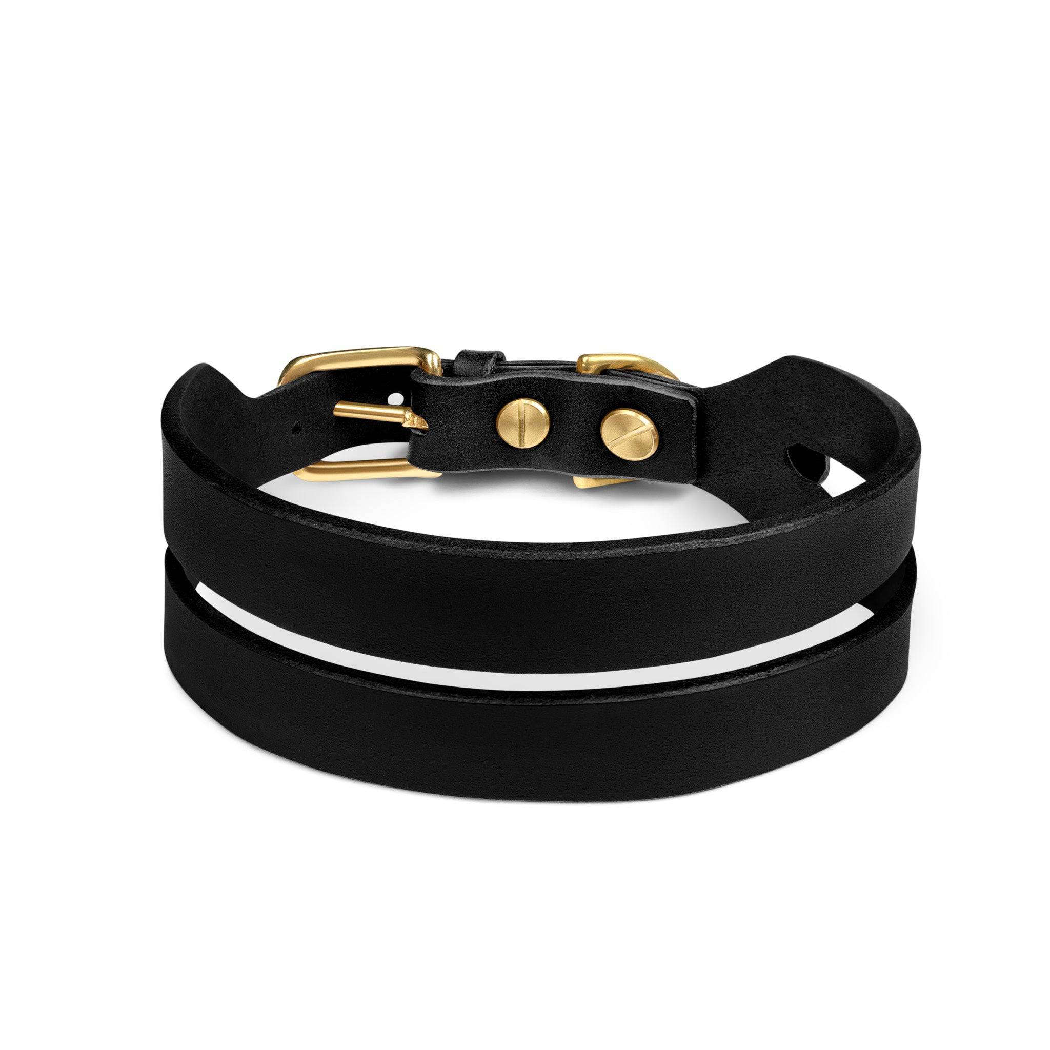 Black leather Halo Wide Dog Collar by The Dogs Company with sturdy buckle and wide design for comfortable fit.