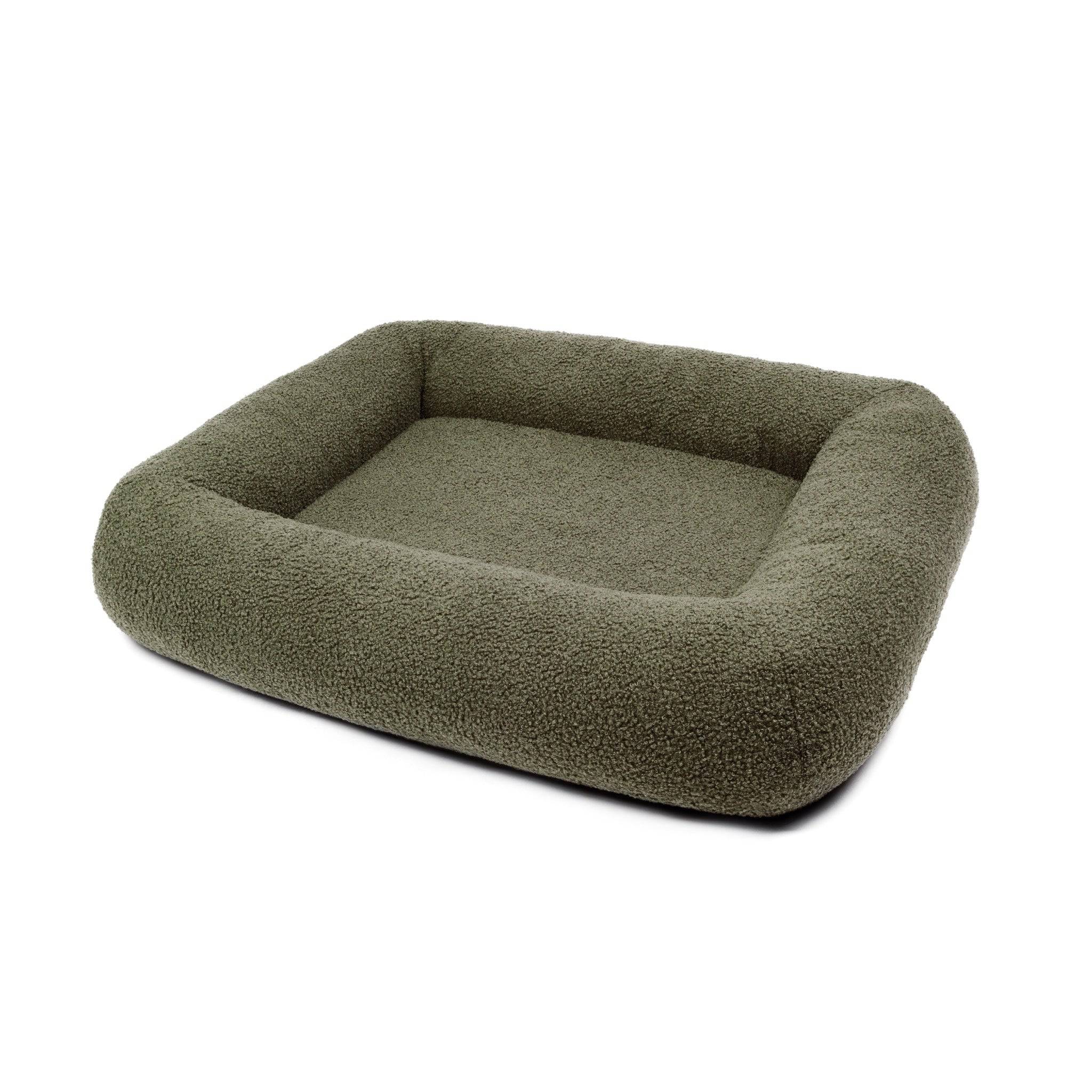 Soft bouclé infinity pet bed by The Dogs Company featuring a cozy, plush design ideal for small and medium-sized dogs.