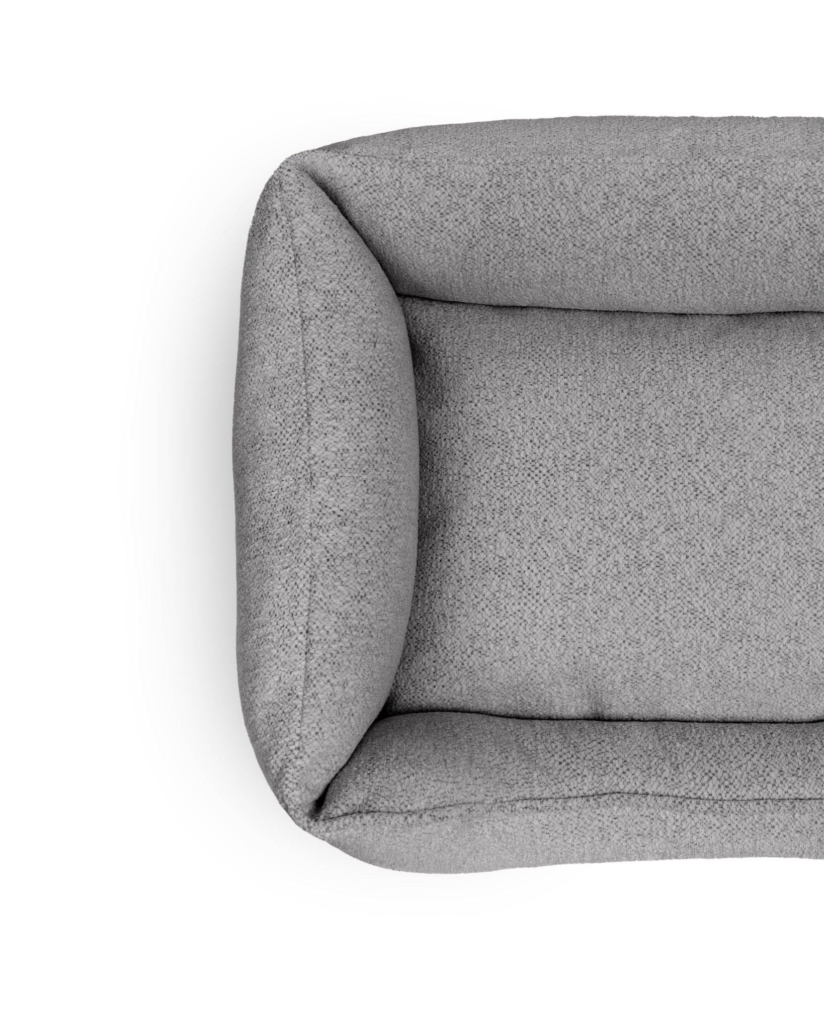 Gaya Lounge Pet Bed by The Dogs Company in stone color, featuring a cozy, cushioned design for comfortable pet lounging.