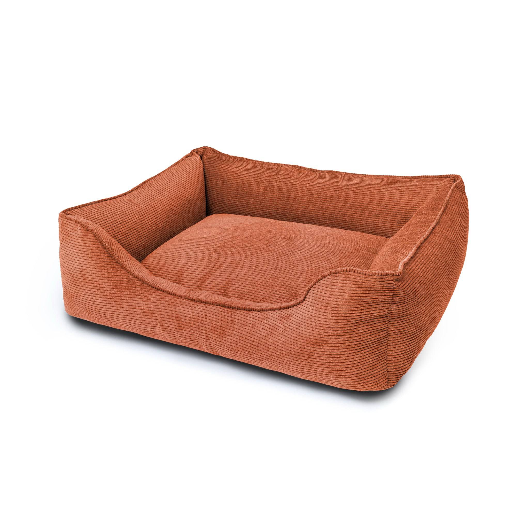 The Dogs Company Ridge Lounge Pet Bed with plush fabric, featuring a cozy, elevated design for dogs to rest comfortably.