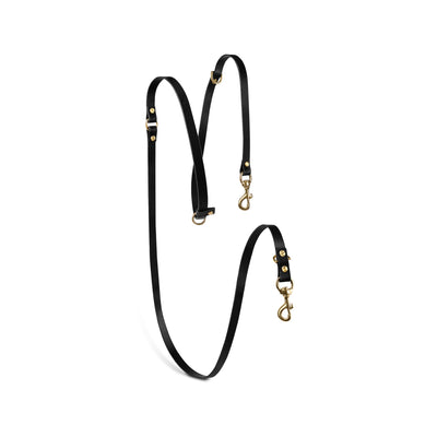 Grace leather collar and Aura handsfree leash bundle by The Dogs Company, featuring black leather collar and leash for dog walking.