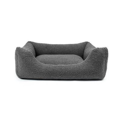 Obsidian Bouclé Lounge Pet Bed by The Dogs Company with soft, textured fabric and cozy design for comfortable pet rest.