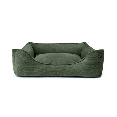 Forest green Ridge Lounge Pet Bed by The Dogs Company, showcasing a cozy, cushioned bed with raised edges for comfort.
