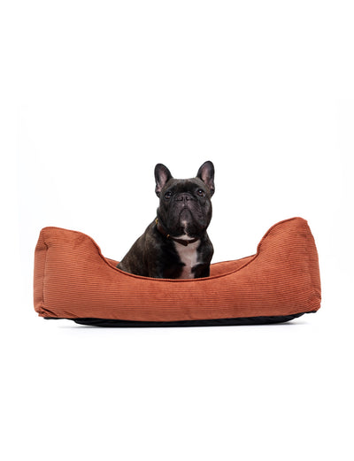 Comfortable Ridge Lounge Bed for dogs by The Dogs Company, featuring a cozy, plush pet bed with a stylish design.