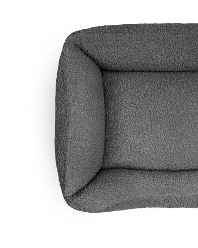 Pet teddy lounge bed in obsidian color by The Dogs Company, cozy cushioned pet bed for comfortable lounging.