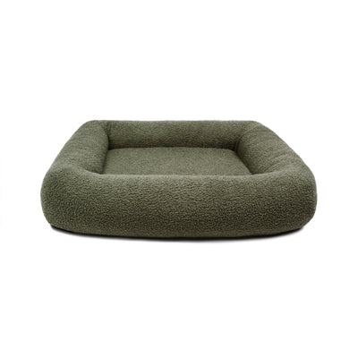 Soft Cloud Bouclé Infinity Pet Bed by The Dogs Company featuring plush, circular design for cozy comfort.