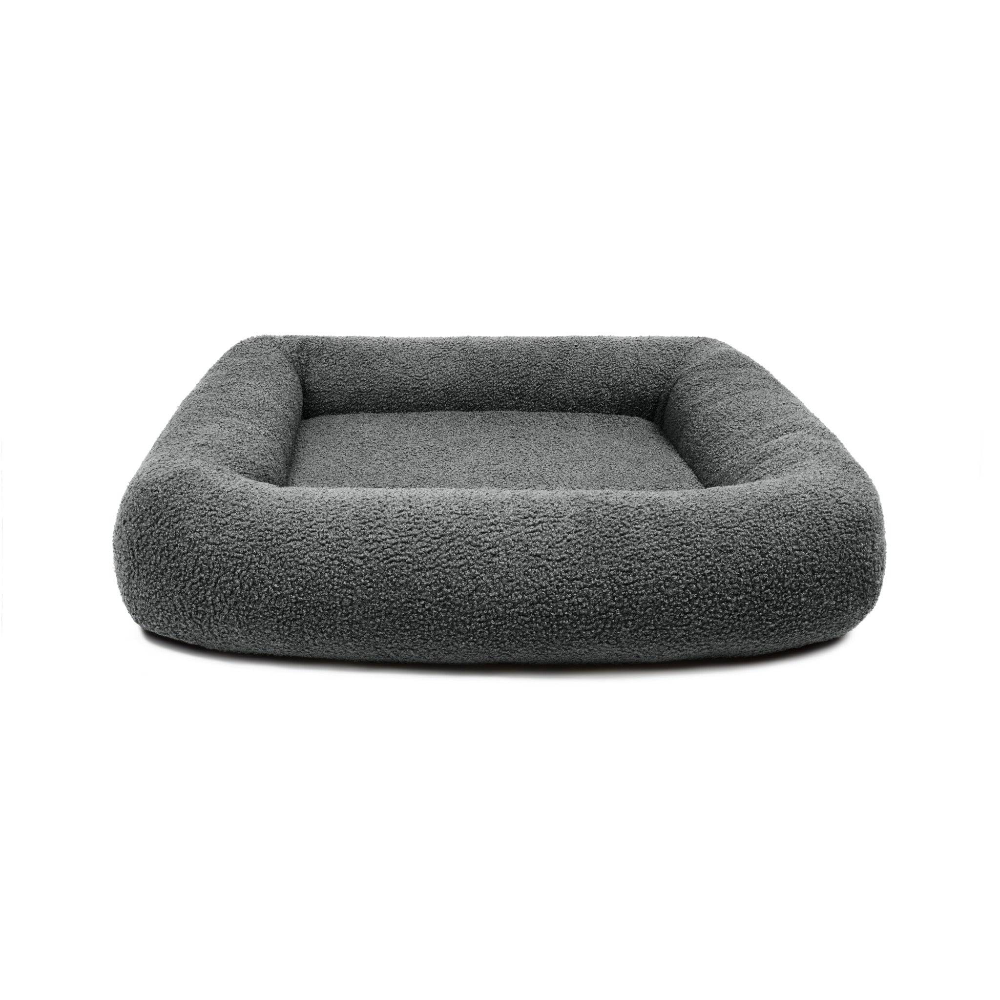 Soft stone Bouclé Infinity Pet Bed by The Dogs Company featuring plush, cozy fabric and a circular design for ultimate comfort.