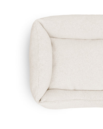 Cozy Gaya Lounge Pet Bed by The Dogs Company with soft fabric and cushioned sides, ideal for small to medium dogs.