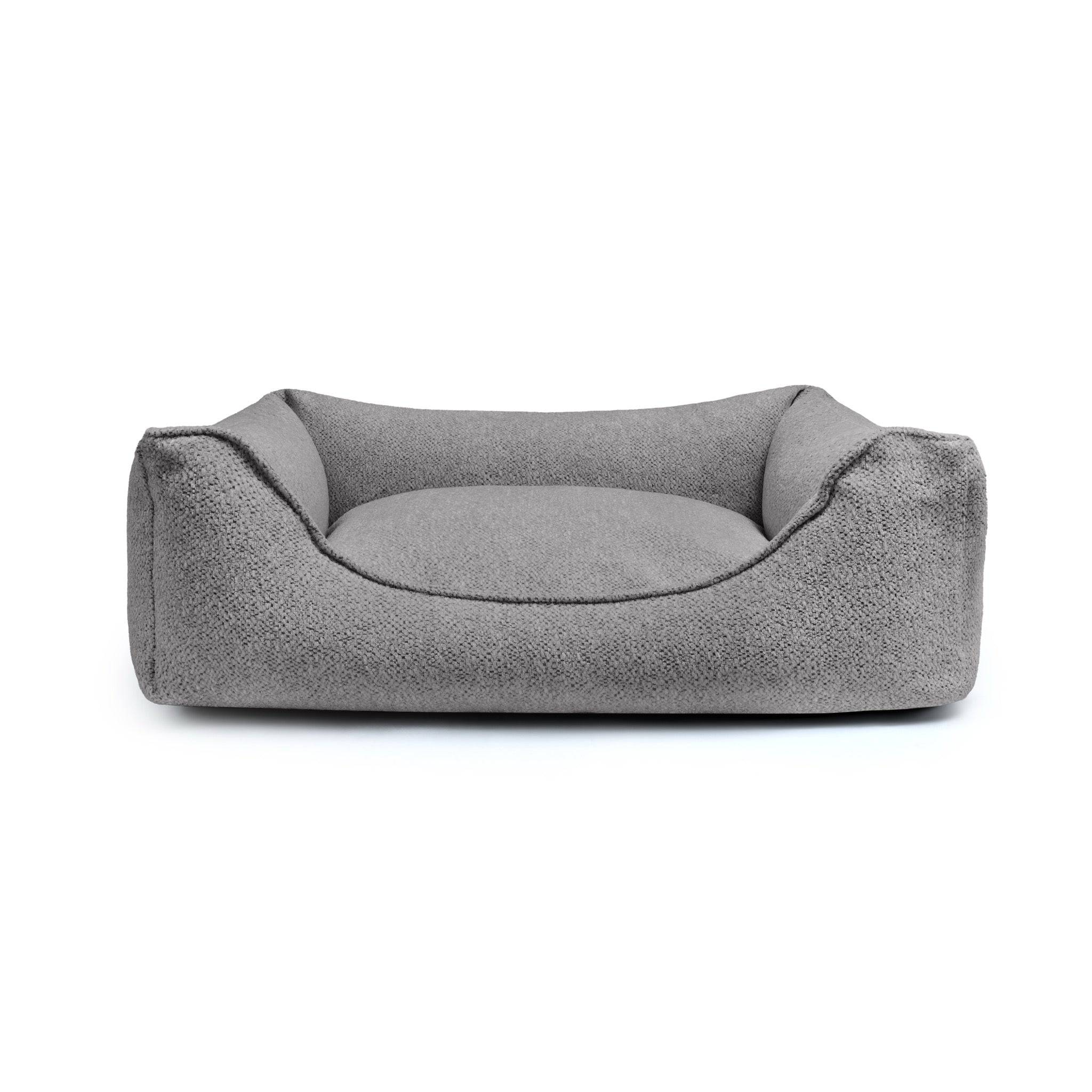 Gaya Lounge Bed by The Dogs Company, a cozy stone-colored pet bed with a cushioned, couch-style design for dogs.