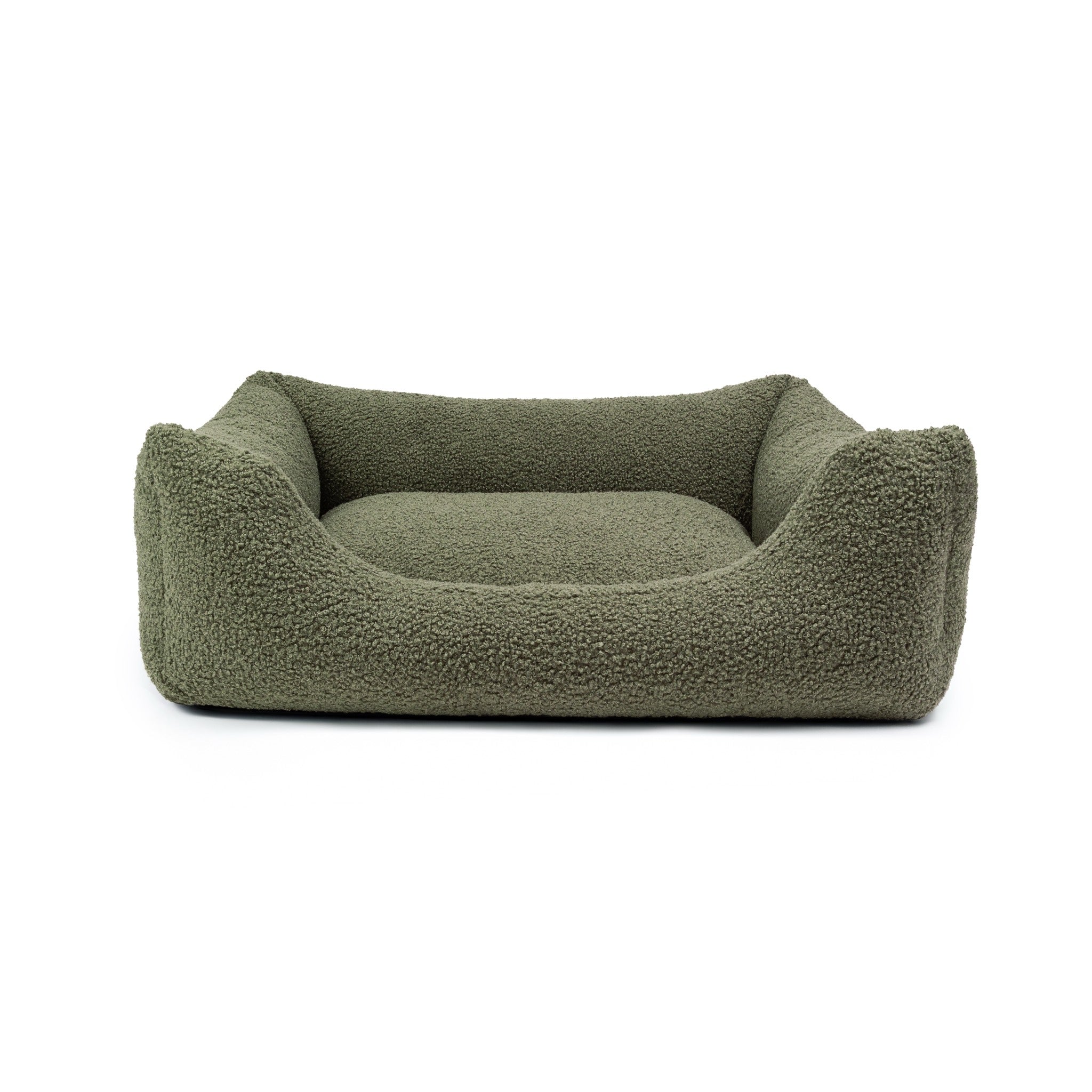 Soft cloud bouclé lounge bed for pets by The Dogs Company, featuring plush fabric and cozy design for comfort and relaxation.