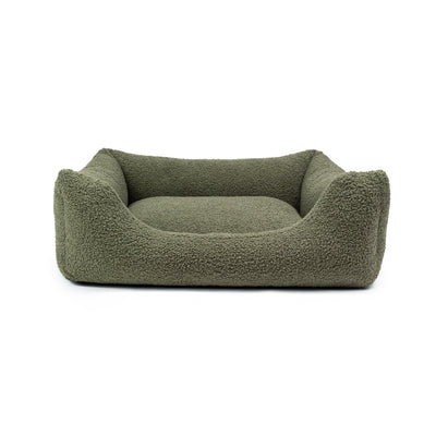 Soft cloud bouclé lounge bed for pets by The Dogs Company, featuring plush fabric and cozy design for comfort and relaxation.