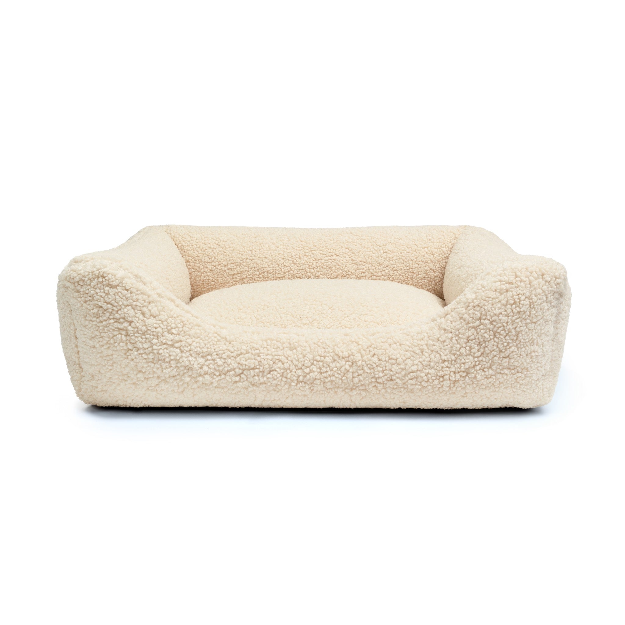Soft Teddy Lounge Bed for pets by The Dogs Company, featuring plush fabric and cozy design for ultimate comfort.